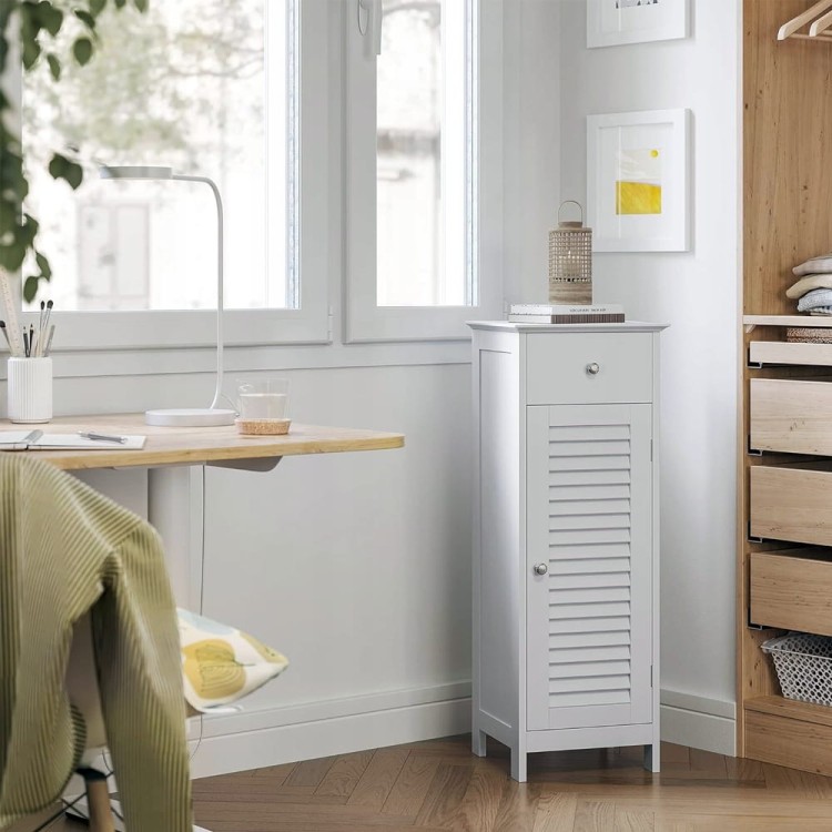 Wielofunkcyjna szafka w aranżacji biurowej, z książkami na górnej powierzchni.