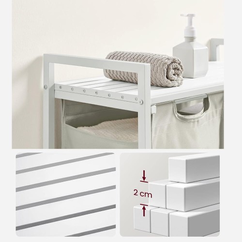 Praktyczny kosz na pranie z wysuwanymi workami. Zastosowanie szyn ułatwia dostęp do wnętrza, a system mocowania na rzepy pozwala na szybkie zdjęcie torby w celu jej wyczyszczenia.