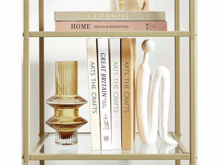 Detal regału Glamour – szlifowane krawędzie szkła i złota rama