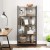 Regał czteropoziomowy vintage LOFT – elegancki dodatek do gabinetu lub salonu. Połączenie czarnej konstrukcji stalowej i półek w odcieniach brązu podkreśla styl industrialny i funkcjonalność wnętrza.